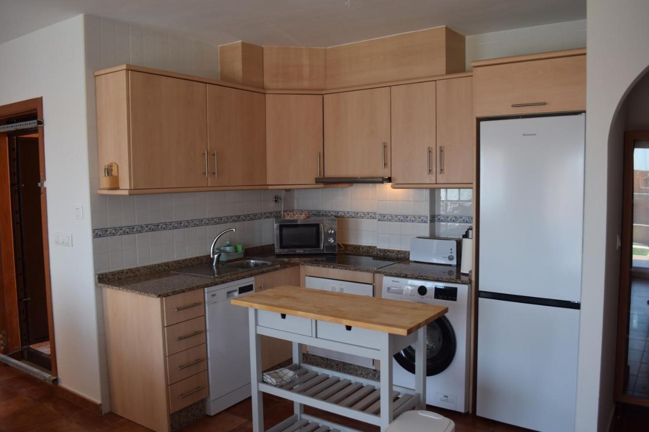 Espacioso Apartamento Con Preciosos Jardines Y Bbq Isla Plana Esterno foto
