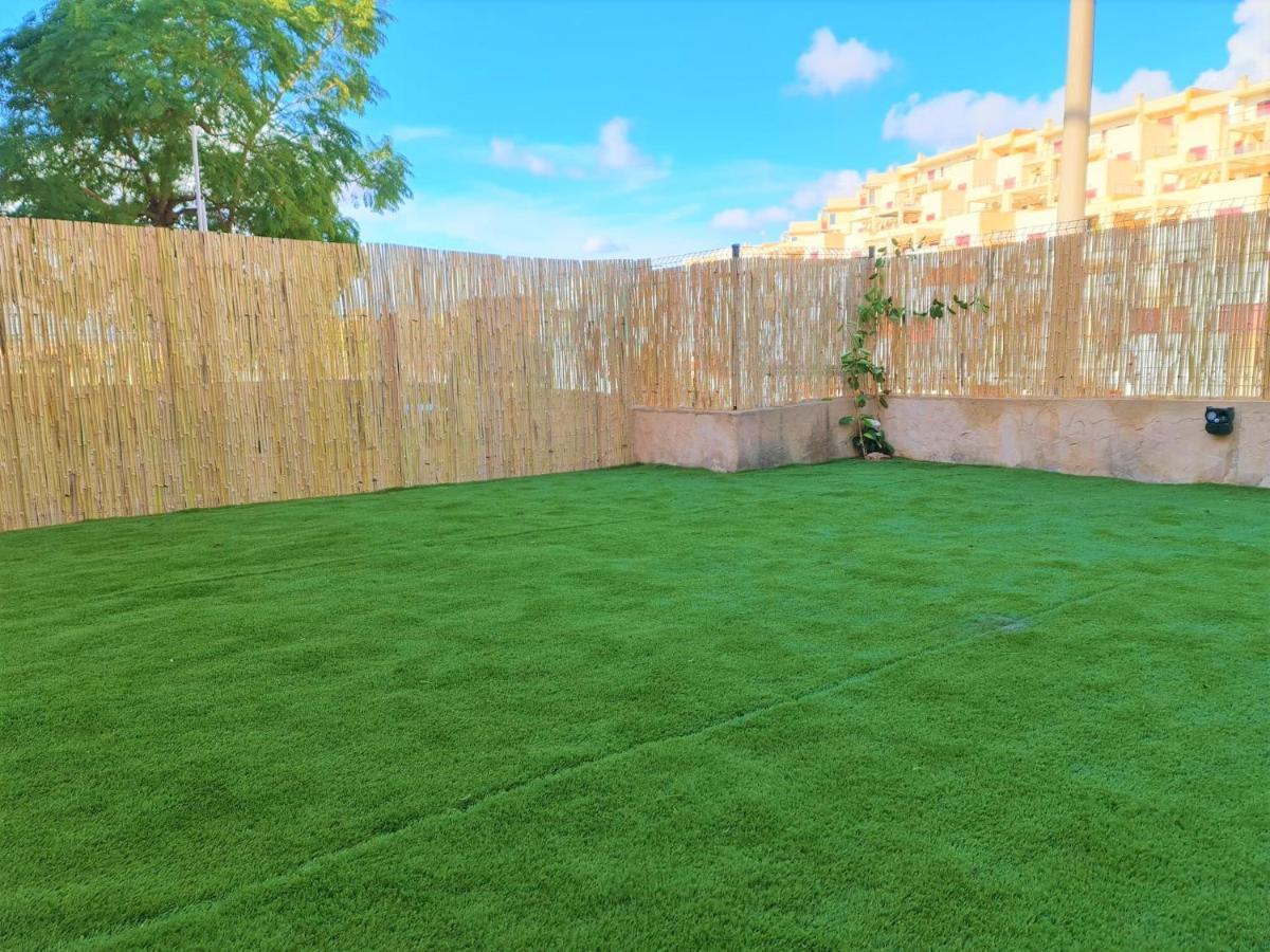 Espacioso Apartamento Con Preciosos Jardines Y Bbq Isla Plana Esterno foto