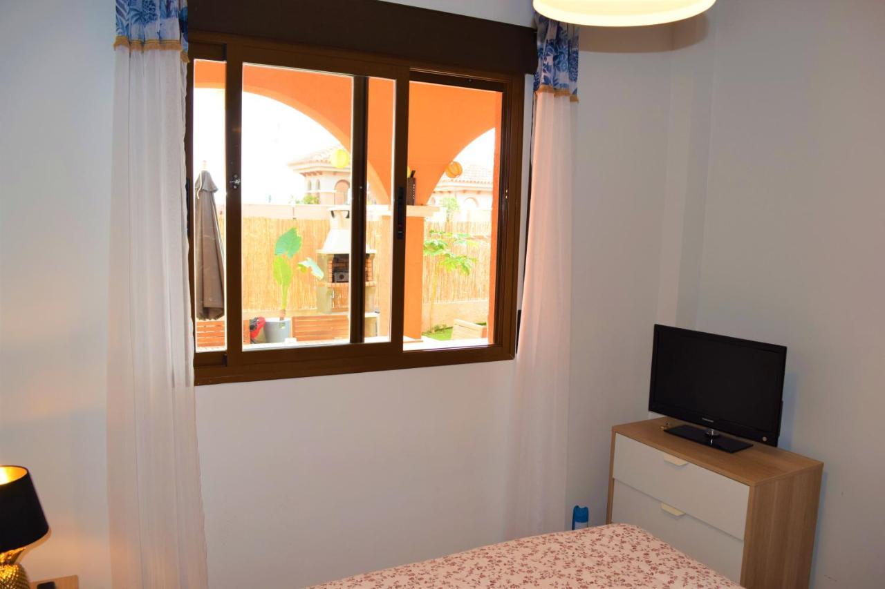 Espacioso Apartamento Con Preciosos Jardines Y Bbq Isla Plana Esterno foto